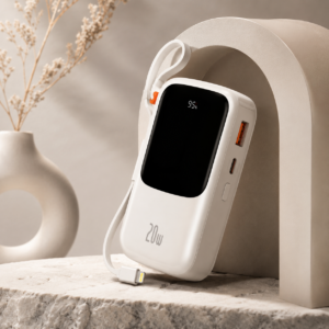 Baseus Qpow Pro 10000mAh 20W Power Bank IP Edition in a premium minimalist lifestyle setup with built-in Lightning cable and digital battery display.