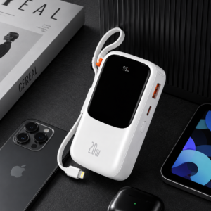 Baseus Qpow Pro 10000mAh 20W Power Bank IP Edition displayed with iPhone, tablet, and wireless earbuds in a premium workspace setup.