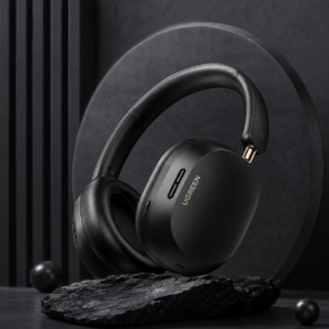 UGREEN HiTune Max5c Hybrid ANC Wireless Headphones Black displayed in a premium luxury dark theme studio setup with elegant lighting and modern product styling.
