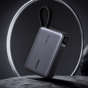 UGREEN Nexode 145W 20000mAh Power Bank Black floating in a premium luxury dark theme with built-in USB-C cable and smart digital display.