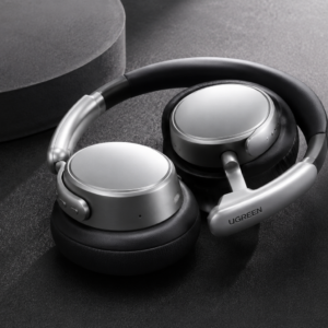 UGREEN Studio Plus ANC Wireless Headphones Silver premium over-ear Bluetooth headphones with adaptive noise cancellation on luxury dark background